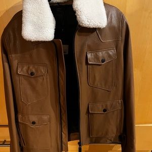 Russian. Brand new mens genuine leather jacket with shearling